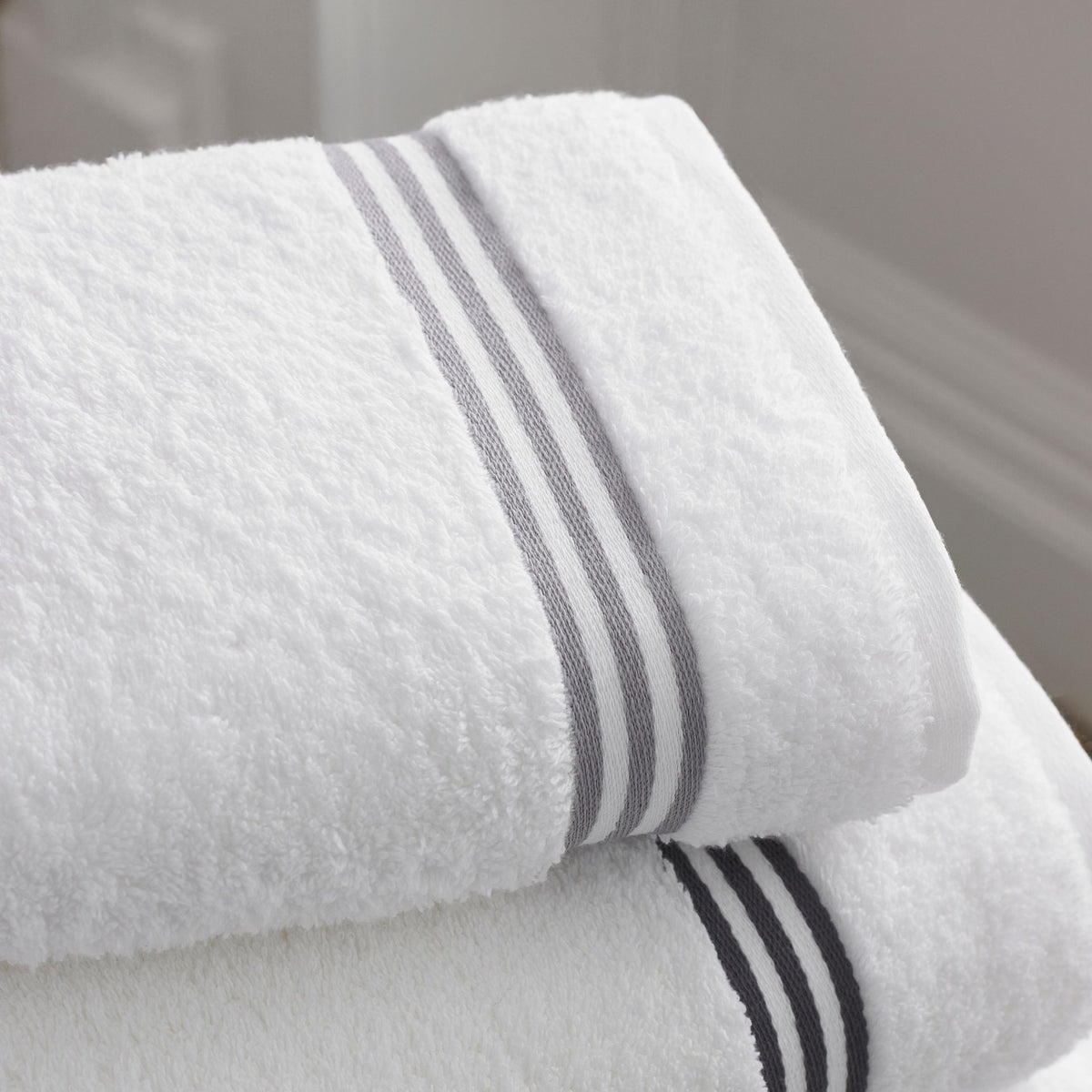 Elegant white towels stacked lifestyle