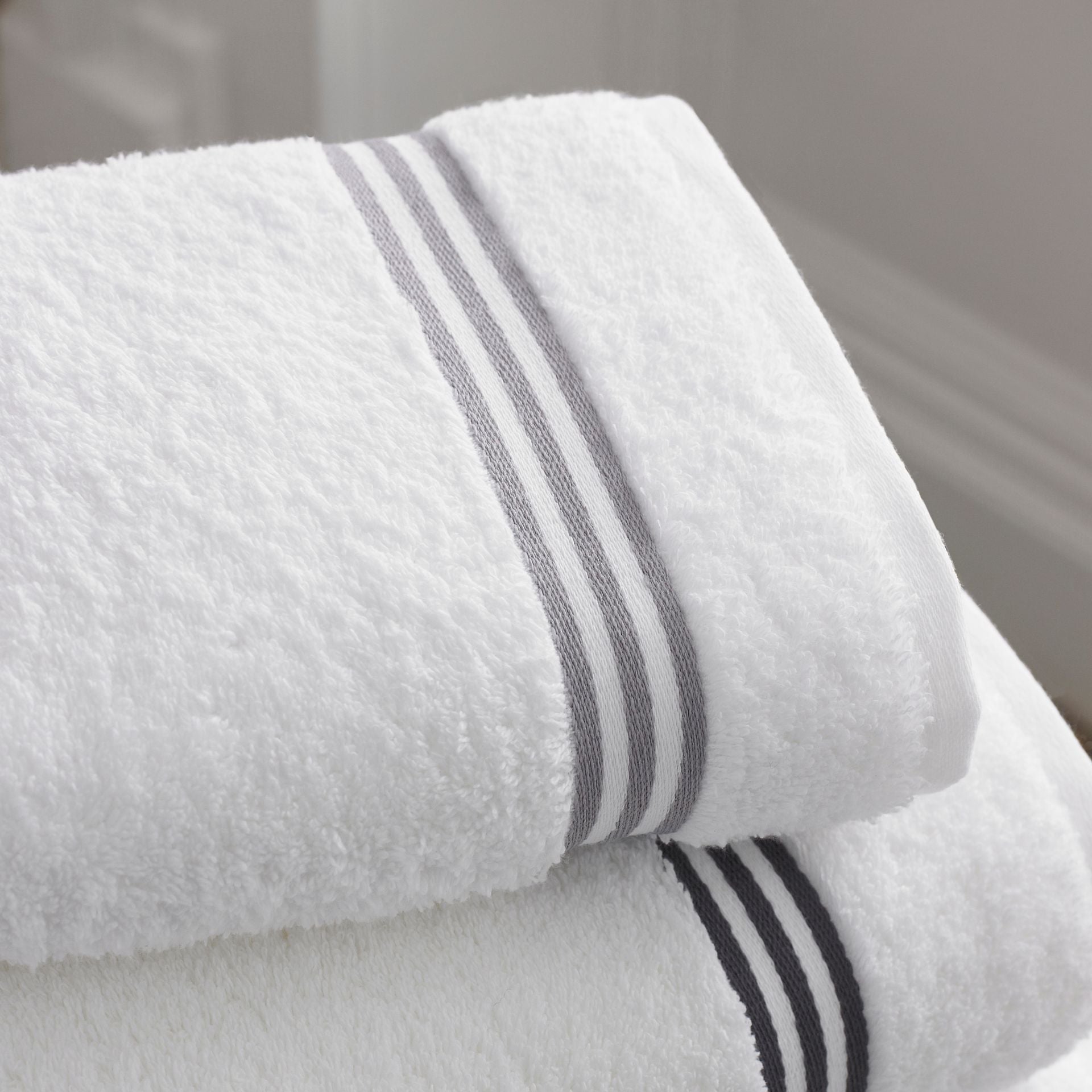 Elegant white towels stacked lifestyle