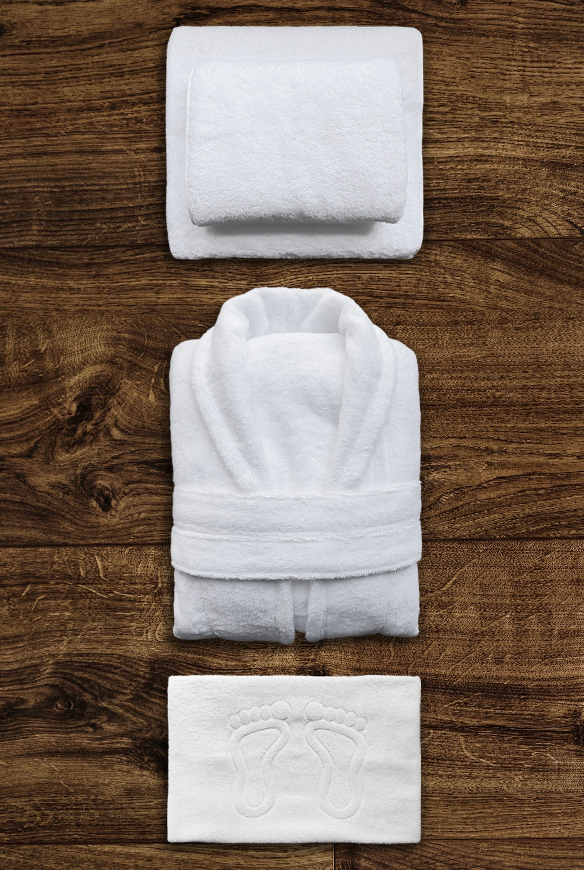 Folded towels and bathrobe resort styling