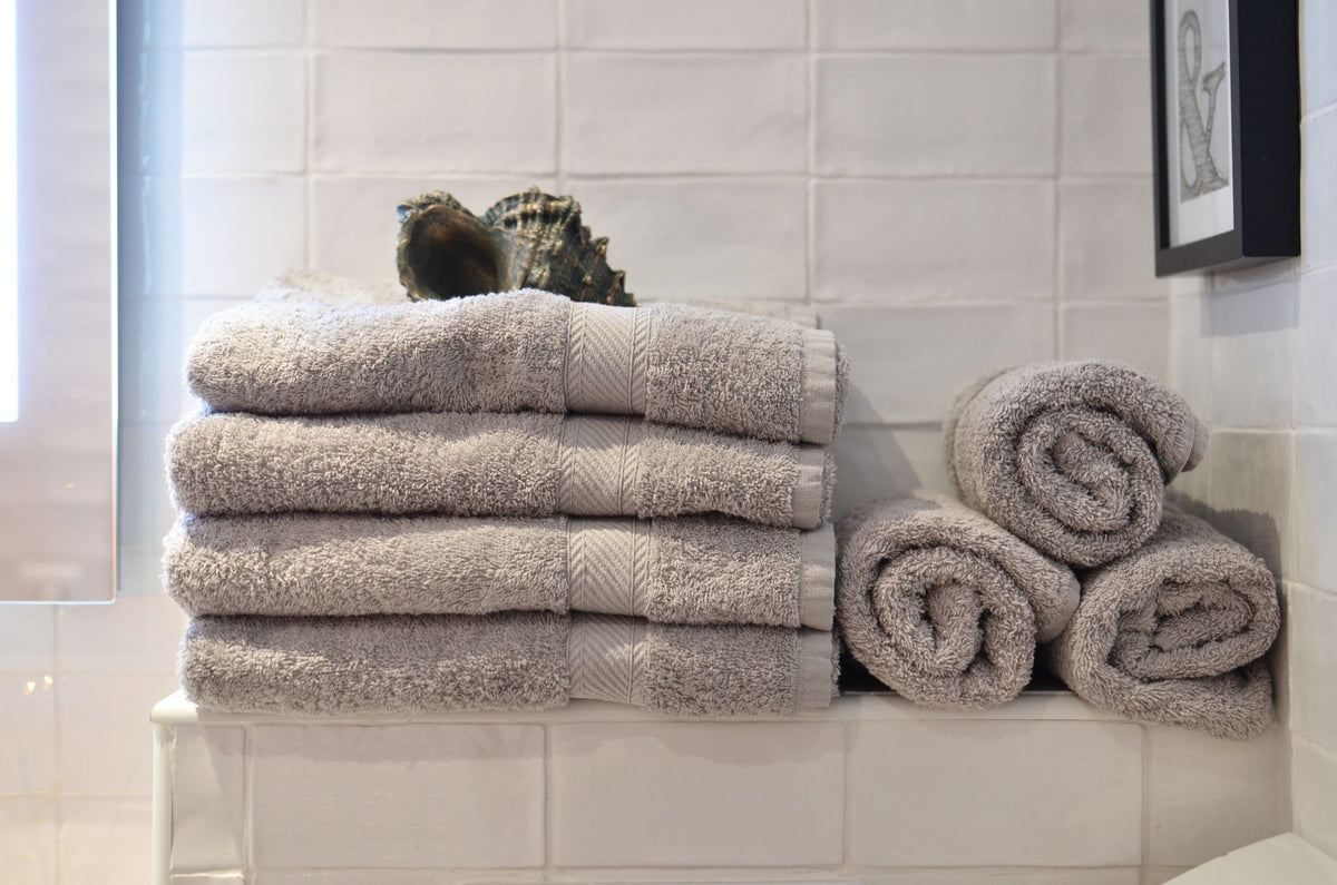 Spa towels on shelf modern bathroom